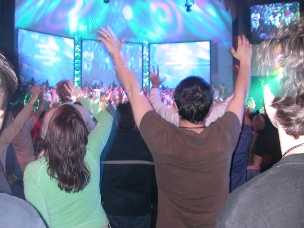 worship with uplifted hands